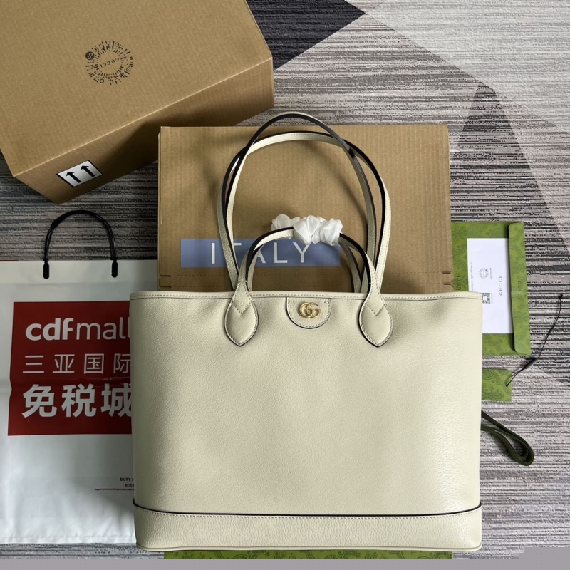 G*u*i shopping bags